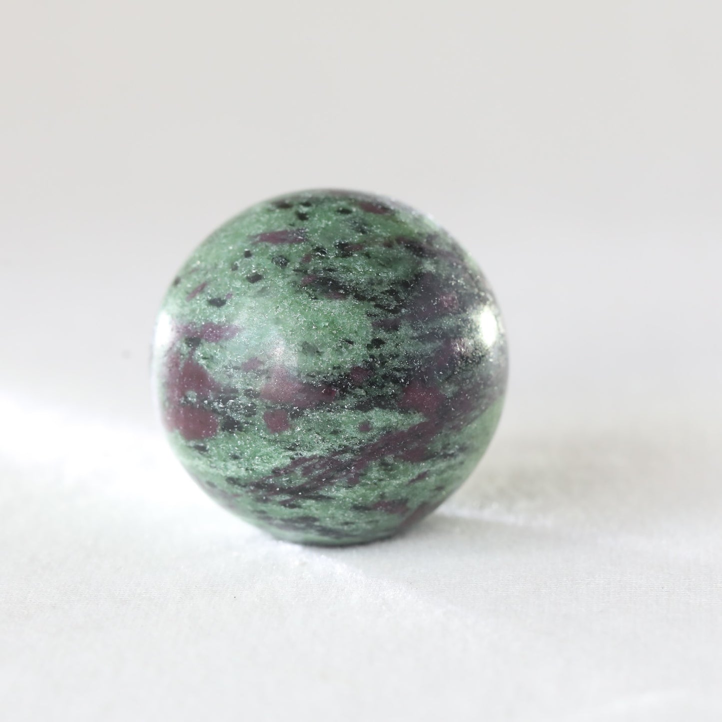 Ruby Zoisite Sphere183.35GM - Sentient Crystals - stone type - stone keywords