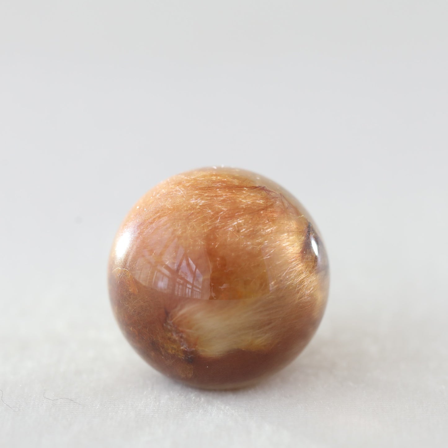 Red With Golden Rutile Sphere 55.80gm - Sentient Crystals - stone type - stone keywords