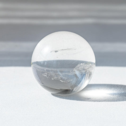 Clear Quartz Blue Feather Sphere
Blue Feather Quartz Sphere
Quartz Sphere with Blue Inclusions
Blue Inclusions in Clear Quartz Sphere
clear quartz sphere 
feather sphere
sentient crystals