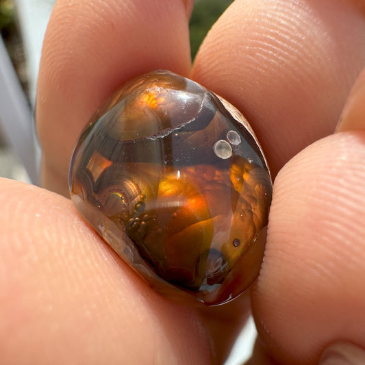 natural stone with layerd of red , orange , and brown reflecting grounding and protective energy