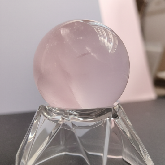 pink rose quartz sphere with sphere stand