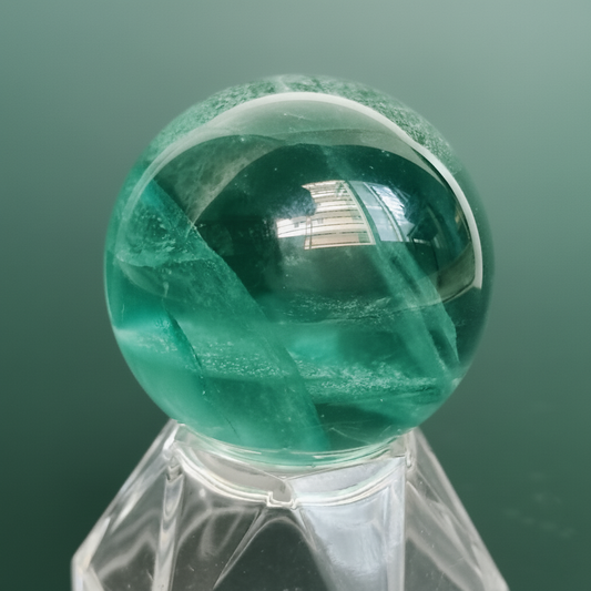 green fluorite phantom sphere and with ball stand