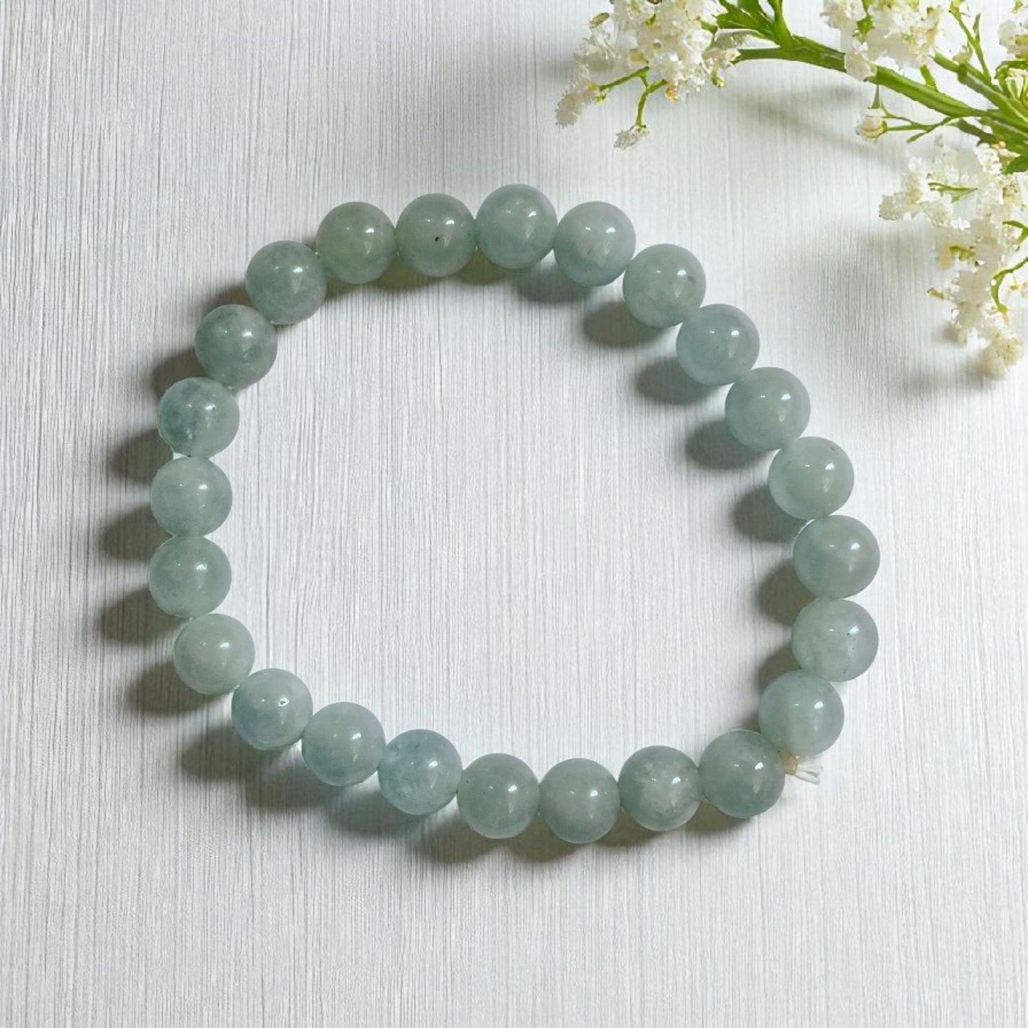 aquamarine bracelet with white background