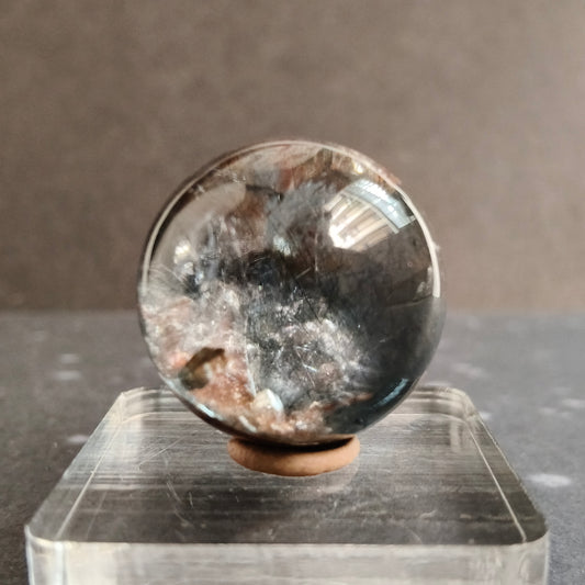 clear quartz hematite with rutile sphere with transparent base