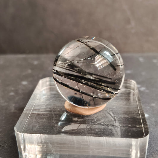 clear quartz with tourmaline sphere with transparent base