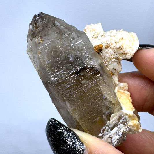 STONE FOR NEGETIVITY 
SMOKEY QUARTZ CLUSTER
SMOKEY QUARTZ WITH FELDSPAR
HEALING STONE 
SENTIENT CRYSTALS