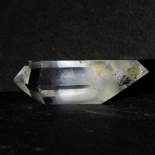 Crystal prism on a dark background