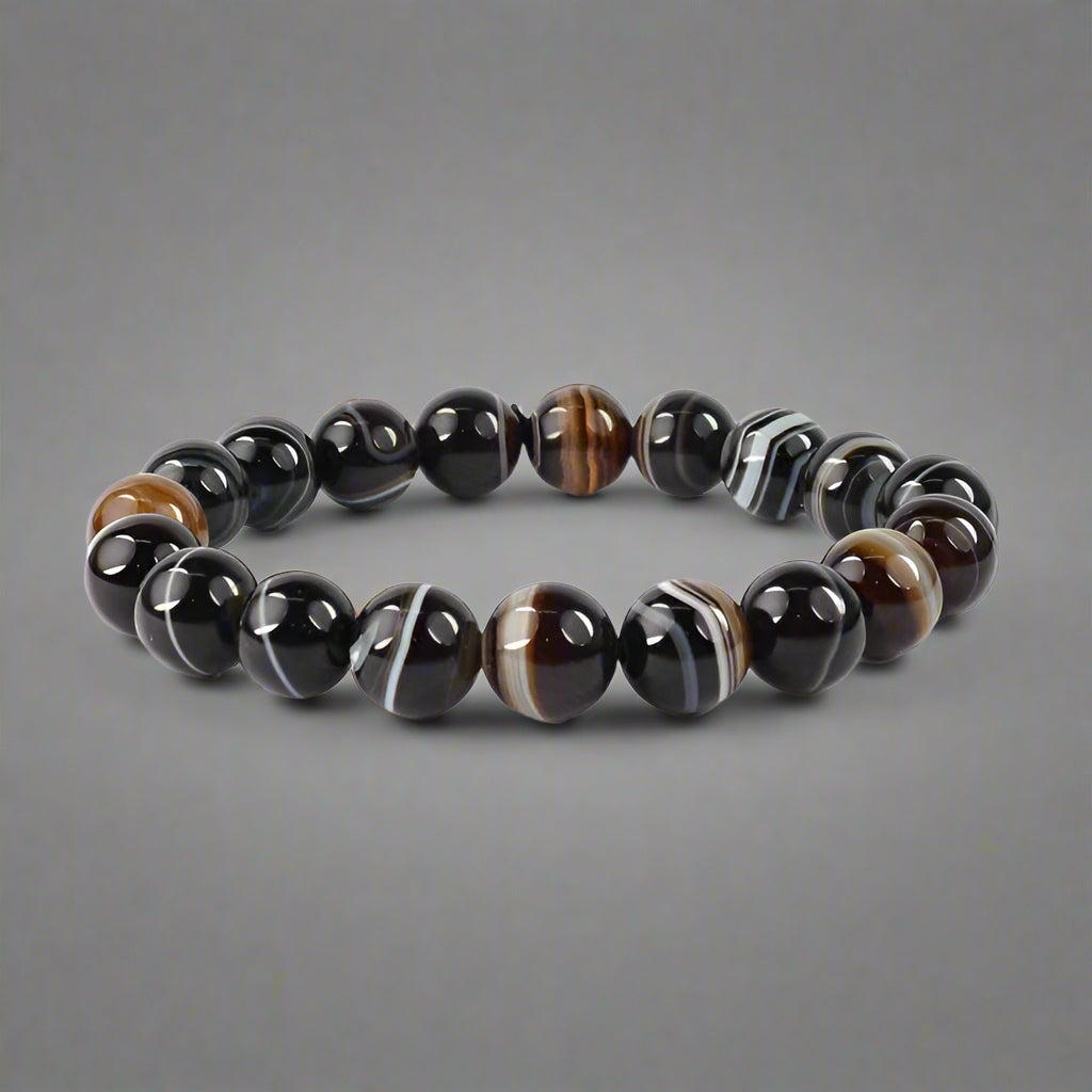 Black Sulemani Bracelet for protection and balance
Natural Black Sulemani Stone Bracelet healing crystal
Handmade Black Sulemani Bead Bracelet spiritual jewelry