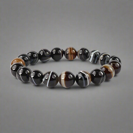 Black Sulemani Bracelet for protection and balance

Natural Black Sulemani Stone Bracelet healing crystal

Handmade Black Sulemani Bead Bracelet spiritual jewelry